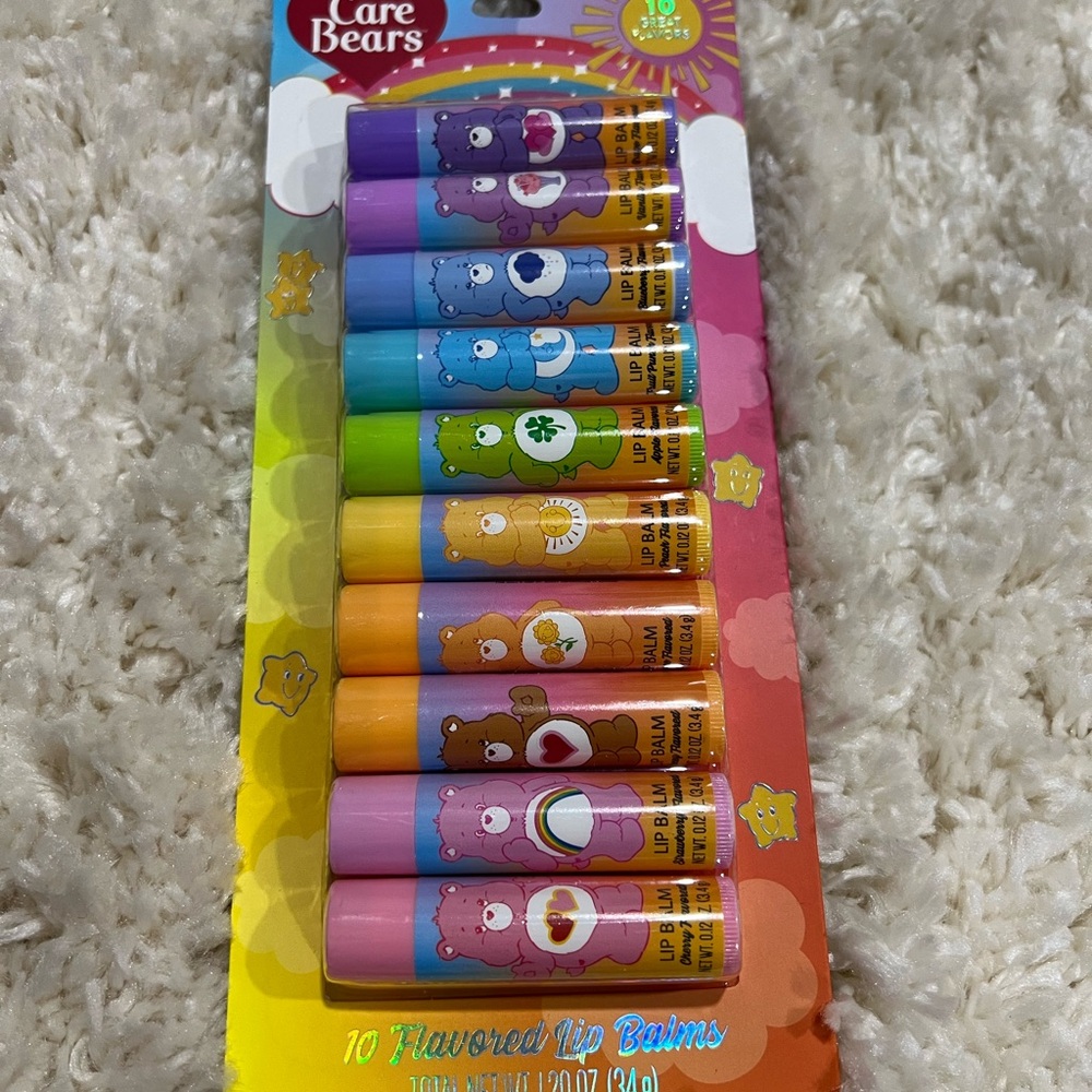 Care Bears lip balm chap stick lip gloss new in package so cut pack of ten